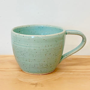 Robin-egg blue speckled cups