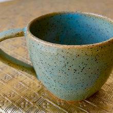 Load image into Gallery viewer, Green-blue speckled cups.
