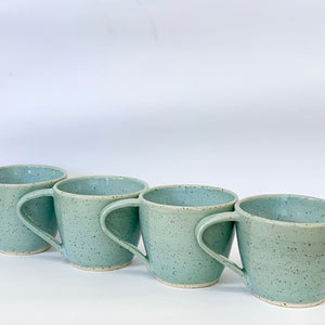 Robin-egg blue speckled cups