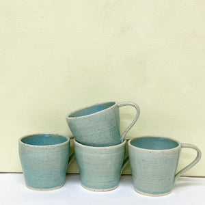 14. Robin-egg blue cups. SOLD